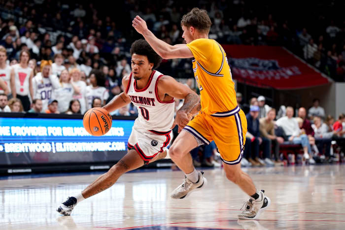 Belmont guard Ja'Kobi Gillespie (0) drives against Lipscomb guard Joe Anderson (22) during the second half at the Curb Event Center in Nashville, Tenn., Wednesday, Dec. 6, 2023.
